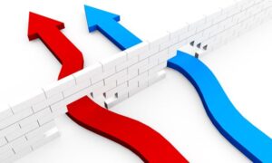 twoarrowsredandbluecoloredbreakingthroughthewallstockphotoslide01 chsy